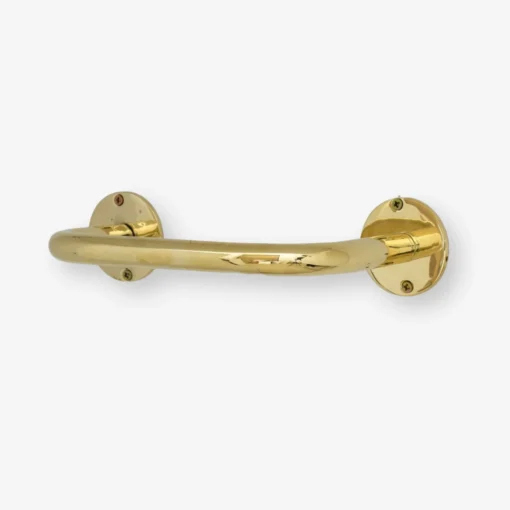 Polished brass curved grab bar with round wall-mount plates and visible screws on white background.