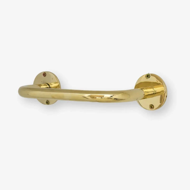 Polished brass curved grab bar with round wall-mount plates and visible screws on white background.
