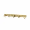 Brass wall-mounted hook rack with five evenly spaced curved hooks on a rectangular mounting bar against a white background.