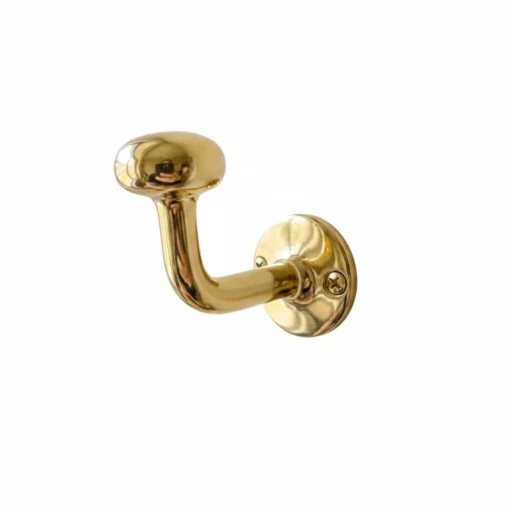 brass wall hook with round mounting plate and two screws, curved arm ending in a rounded knob on white background.