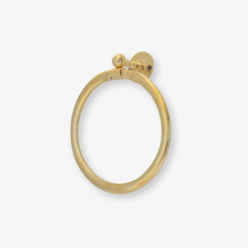 Brass circular towel ring with round wall mount and decorative ball hinge on white background.